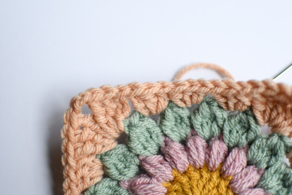 Pull the yarn gently until the newly created stitch blends in with the rest