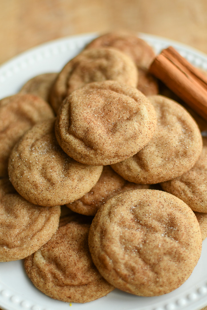 Brown Butter Snickerdoodles with a cinnamon stick on the side. 