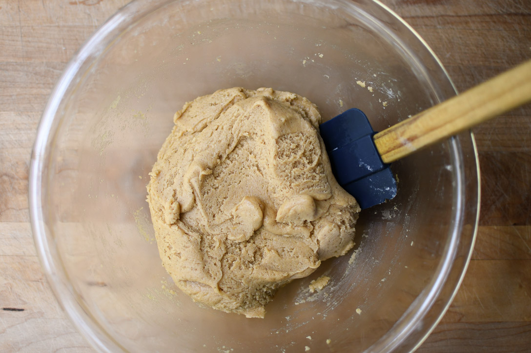 Snickerdoodle dough in a glass bowl