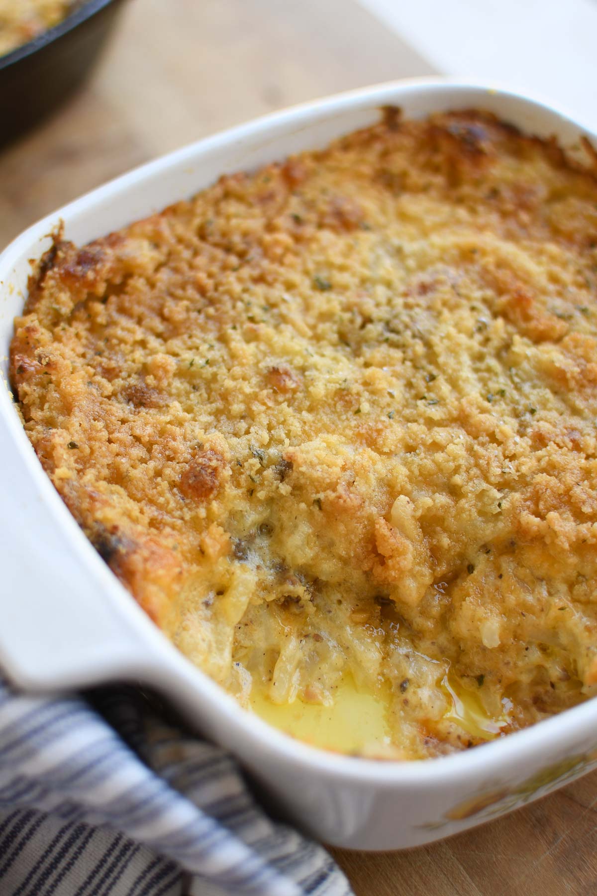 A small baking dish with hashbrown and ground beef casserole