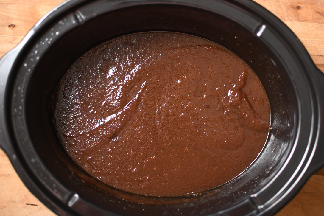 A crockpot of finished pear butter. 