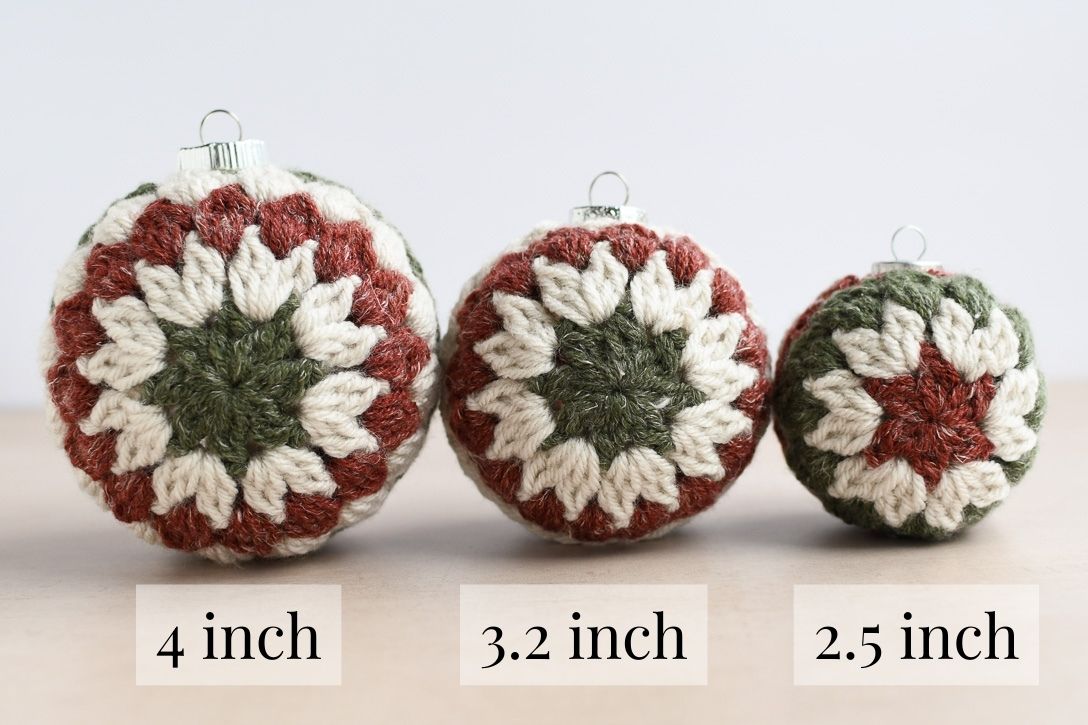 Three crochet ornaments lined up from large to small