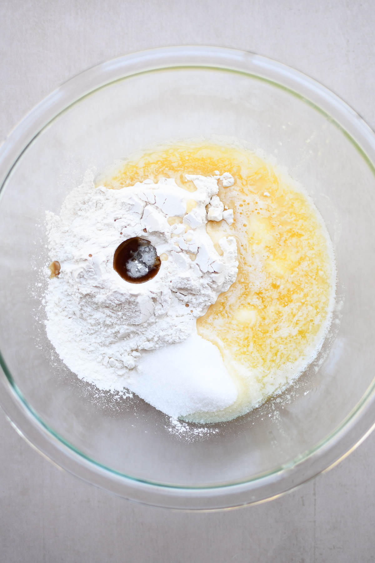 Shortbread crust ingredients in a mixing bowl before mixing