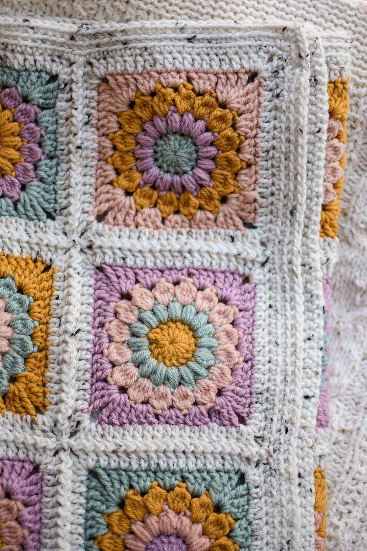 A close up showing the single crochet border and corners