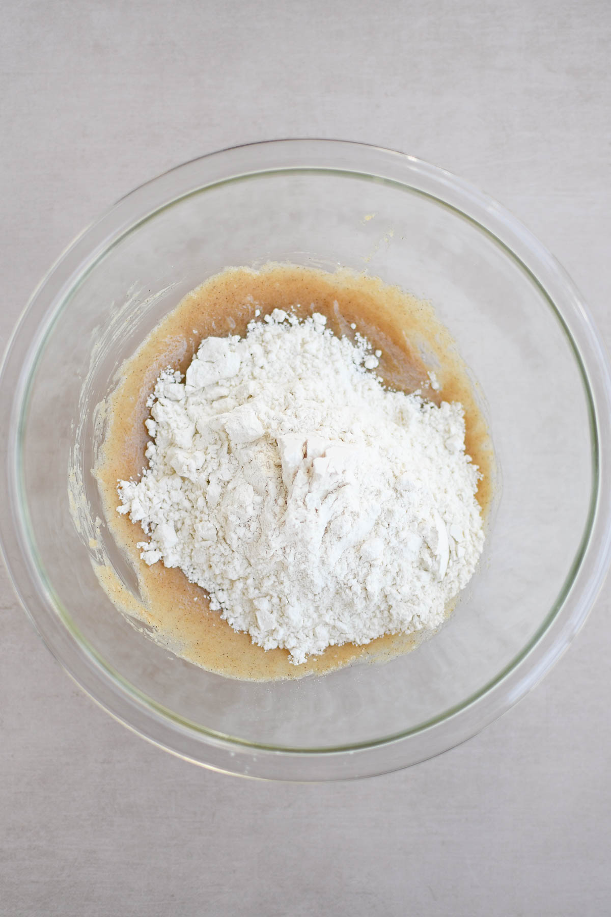 Mixing the flour into the liquid ingredients 