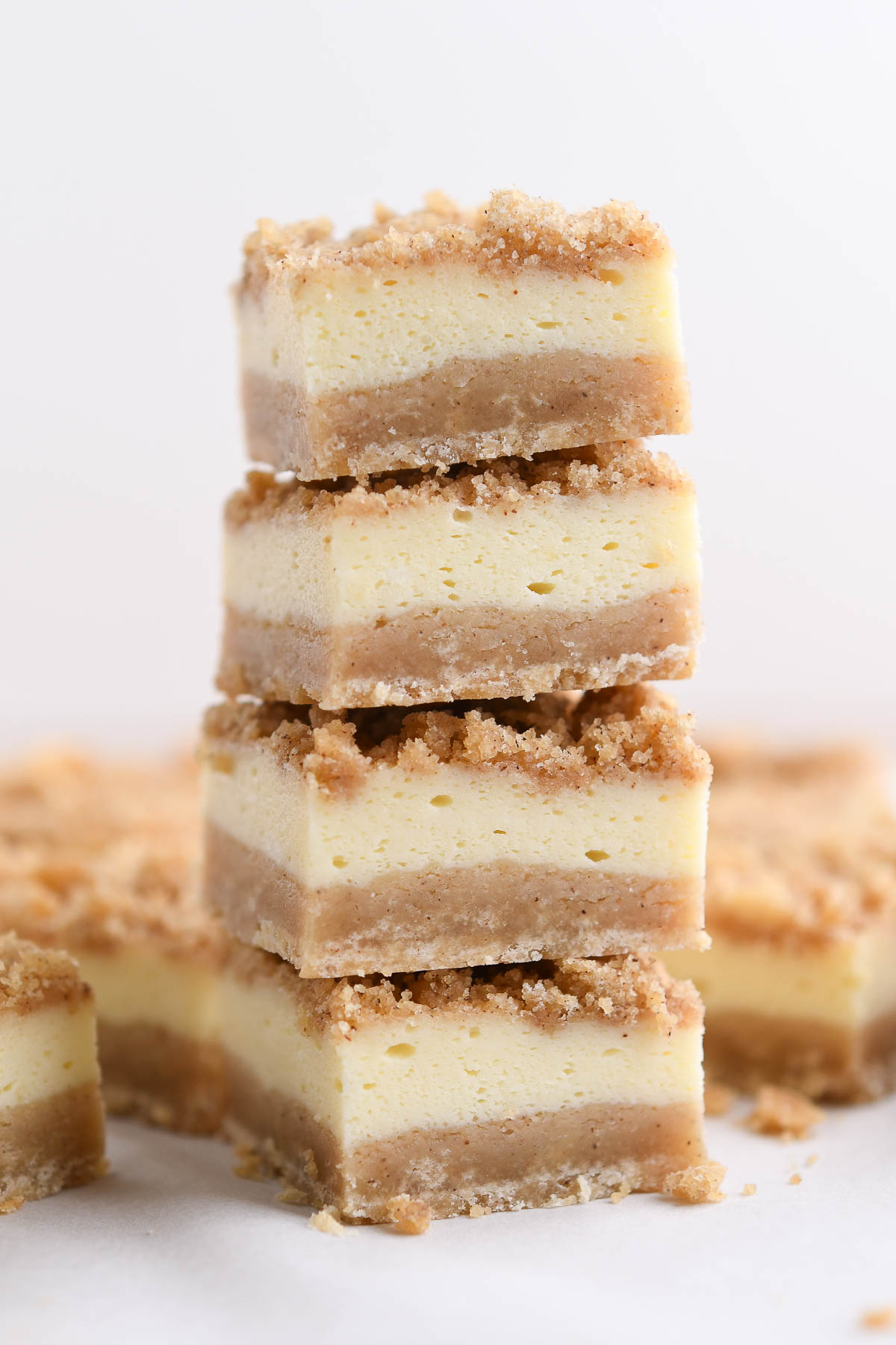 4 bite size squares of snickerdoodle cheesecake bars